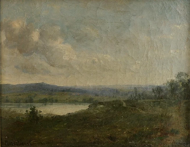 Laghetto in un paesaggio montuoso